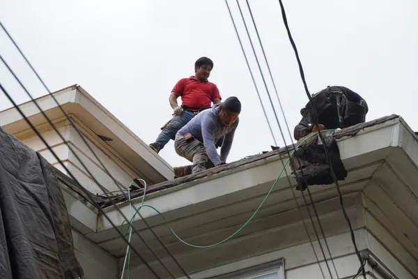Roofers Building a Roof